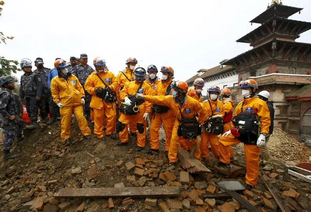 Japanese rescue team members observe the affected areas upon their arrival after the earthquake in Kathmandu, Nepal April 28, 2015. (Photo by Navesh Chitrakar/Reuters)