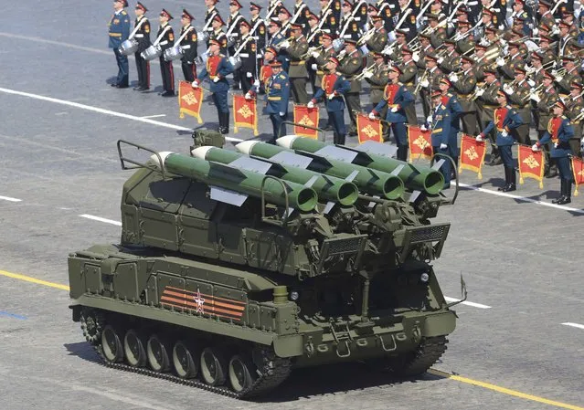Russian BUK-M2/SA-17 Grizzly medium-range battlefield surface-to-air missile system drives during the Victory Day parade at Red Square in Moscow, Russia, May 9, 2015. (Photo by Reuters/Host Photo Agency/RIA Novosti)