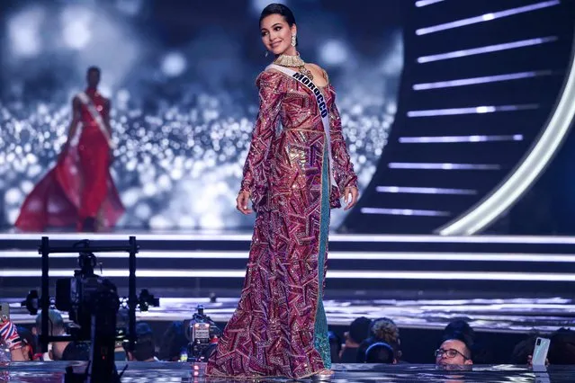 Miss Morocco, Kawtar Benhalima, presents herself on stage during the preliminary stage of the 70th Miss Universe beauty pageant in Israel's southern Red Sea coastal city of Eilat on December 10, 2021. (Photo by Menahem Kahana/AFP Photo)