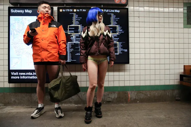 People participate in the annual “No Pants Subway Ride” in the Manhattan borough of New York City, U.S., January 13, 2019. (Photo by Caitlin Ochs/Reuters)