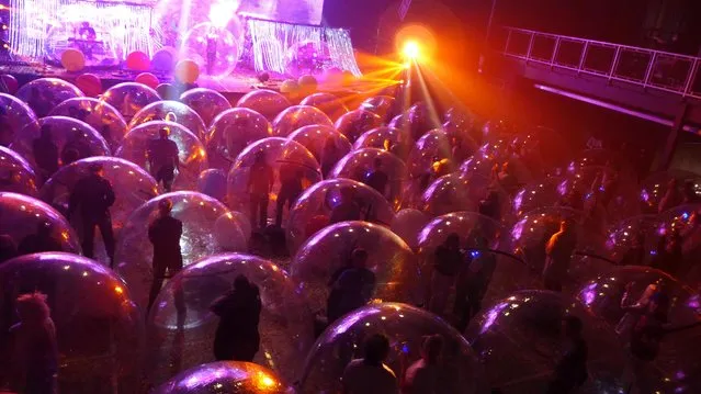 Flaming Lips give a socially-distanced “Space Bubble” concert, using individual inflatable bubbles to avoid the spread of coronavirus, at the Criterion in Oklahoma City, January 22, 2021. (Photo by Flaming Lips/Warner Music/Handout via Reuters)