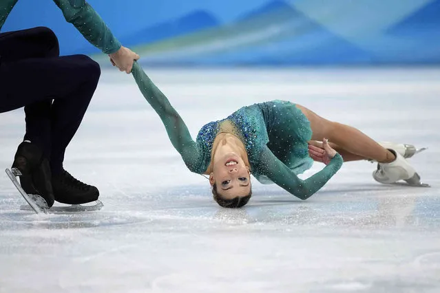 Laura Barquero and Marco Zandron, of Spain, compete in the pairs free skate program during the figure skating competition at the 2022 Winter Olympics, Saturday, February 19, 2022, in Beijing. (Photo by David J. Phillip/AP Photo)