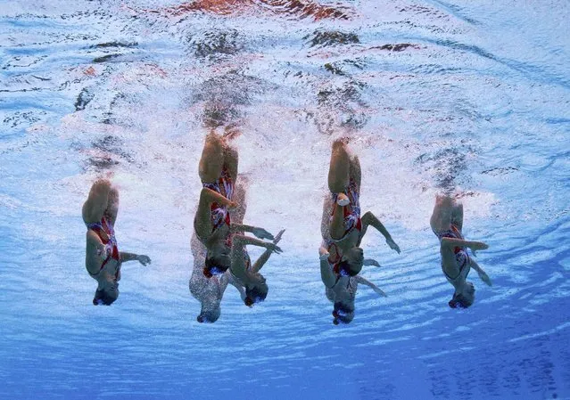 Members of Team Spain are seen underwater as they perform in the synchronised swimming team free routine preliminary at the Aquatics World Championships in Kazan, Russia July 28, 2015. (Photo by Michael Dalder/Reuters)