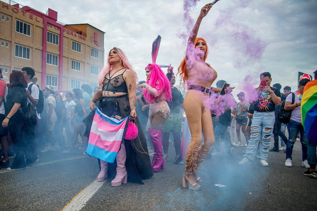 People participate in the LGBT Pride March, in the municipality of Tehuantepec, Oaxaca state, Mexico on June 28, 2023. (Photo by Luis Villalobos/EPA/EFE)