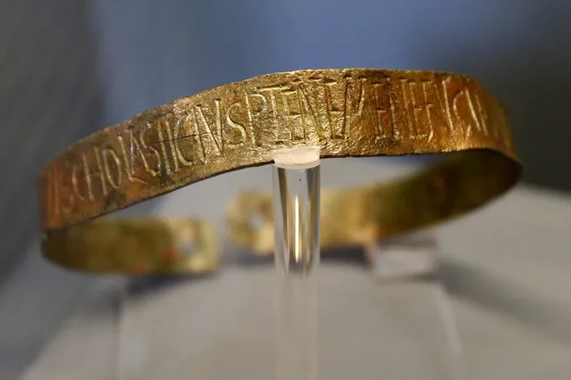 This Monday, June 13, 2016 photo shows a bronze slave collar of the 5th century displayed at “Made in Roma” exhibition at the Trajan's Markets site in Rome. In an ancient twist to today’s Made-in-Italy labeling, Romans of some 2,000 years ago took to branding with zeal, putting names, trademarks and other identifying details with meticulous care on items including tableware, plumbing pipes and lead ammunition for slingshots. (Photo by Fabio Frustaci/AP Photo)