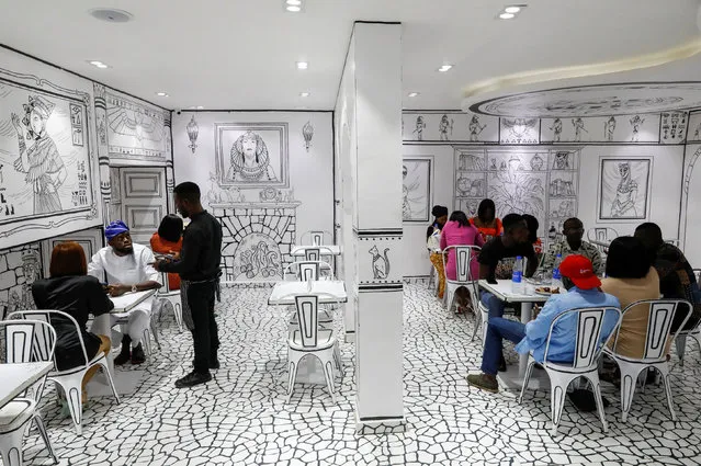 Customers are seen at the Sketch restaurant, which is Africa's first 2D/3D restaurant, in Lagos, Nigeria on May 28, 2022. (Photo by Temilade Adelaja/Reuters)