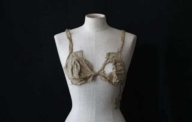 A brassiere from the late Middle Ages is pictured at the University of Innsbruck, archaeology department July 24, 2012. The textiles date back to the year 1440-1485 and were discovered in 2008 during renovations of the castle Lengberg in East Tyrol, according to the university. The decayed finds were pieced together recently. (Photo by Michaela Rehle/Reuters)