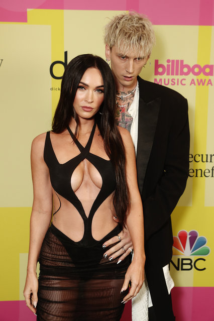 American actress Megan Fox and American rapper  Machine Gun Kelly arrive to the 2021 Billboard Music Awards held at the Microsoft Theater on May 23, 2021 in Los Angeles, California. (Photo by Todd Williamson/NBC/NBCU Photo Bank via Getty Images)
