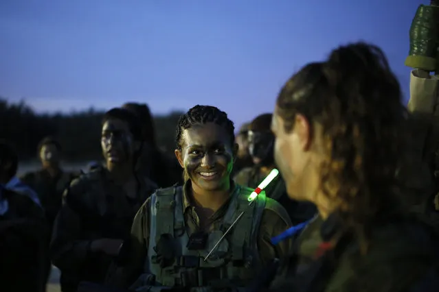 Israeli soldiers of the Caracal battalion take part in a march May 29, 2014. (Photo by Amir Cohen/Reuters)