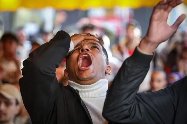 Morocco's supporters react as they watch a live broadcast of the Qatar 2022 World Cup football match between Morocco and Croatia, at a coffee shop in Rabat, on December 17, 2022. (Photo by Fadel Senna/AFP Photo)