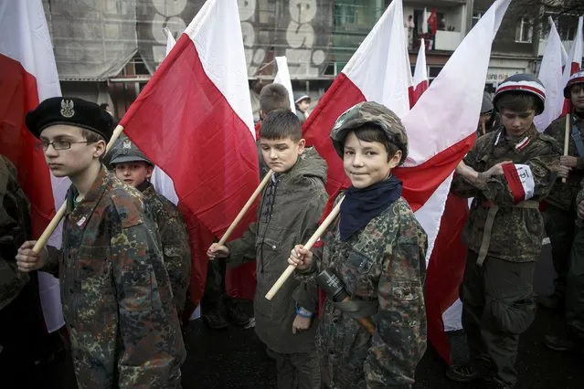 Youths parade wearing World War Two uniforms during the Independence Day celebrations in Gdansk November 11, 2014. (Photo by Lukasz Glowala/Reuters/Agencja Gazeta)