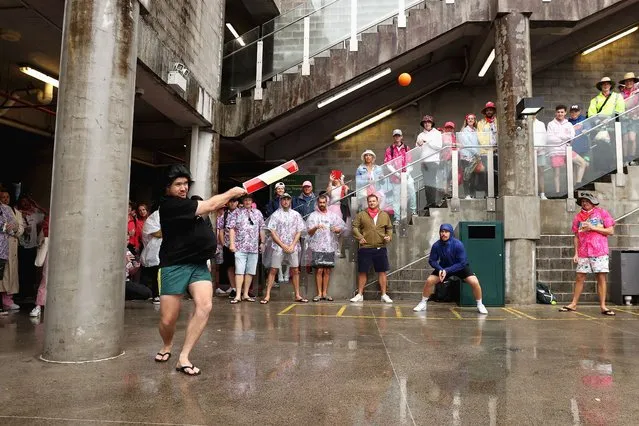 Spectators play an impromptu game of cricket behind the Victor Trumper Stand during a rain delay during day three of the Second Test match in the series between Australia and South Africa at Sydney Cricket Ground on January 06, 2023 in Sydney, Australia. (Photo by Cameron Spencer/Getty Images)