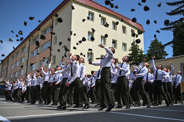 Military cadets of the Lviv lyceum with enhanced military and physical training named after Heroes of Kruty, react after a graduation ceremony, amid Russia's attack on Ukraine, in Lviv, Ukraine on June 7, 2025. (Photo by Anastasiia Smolienko/Reuters)