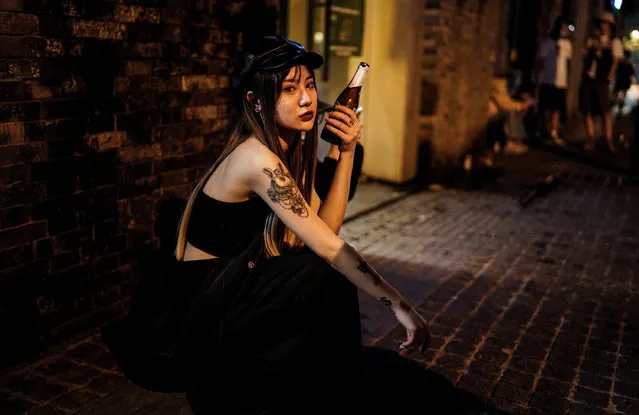 A women drink outside the disco bar on September 18, 2020 in Wuhan, Hubei province, China. As there have been no recorded cases of community transmission in Wuhan since May, life for residents is returning to normal. (Photo by Getty Images)