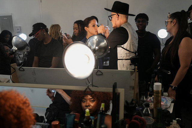 A model sits for hair and makeup prior to the start of the Sergio Hudson Spring/Summer 2026 show during New York Fashion Week, in New York City, U.S., September 12, 2025. (Photo by Christian Monterrosa/Reuters)