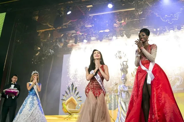 Contestant Trixie Maristela (C) of Philippines reacts as she is crowned winner of the Miss International Queen 2015 transgender/transsexual beauty pageant in Pattaya, Thailand, November 6, 2015. (Photo by Athit Perawongmetha/Reuters)