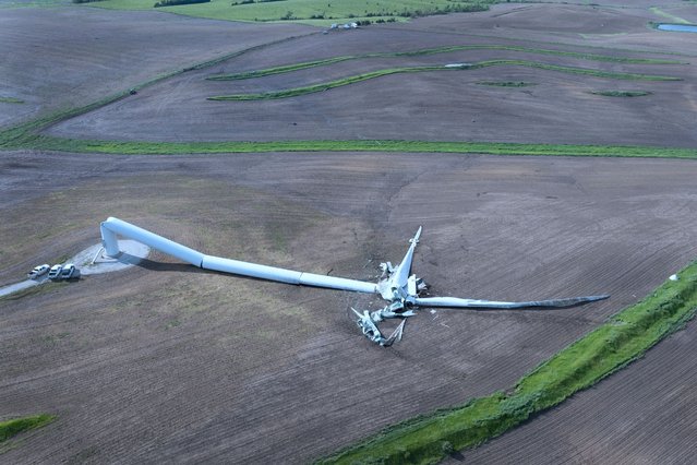 In an aerial view, a wind turbine lies toppled after tornadoes tore through the area yesterday on May 22, 2024 near Prescott, Iowa. Multiple deaths and injuries have been reported from a series of tornadoes and powerful storms that hit several Midwestern states.  (Photo by Scott Olson/Getty Images)