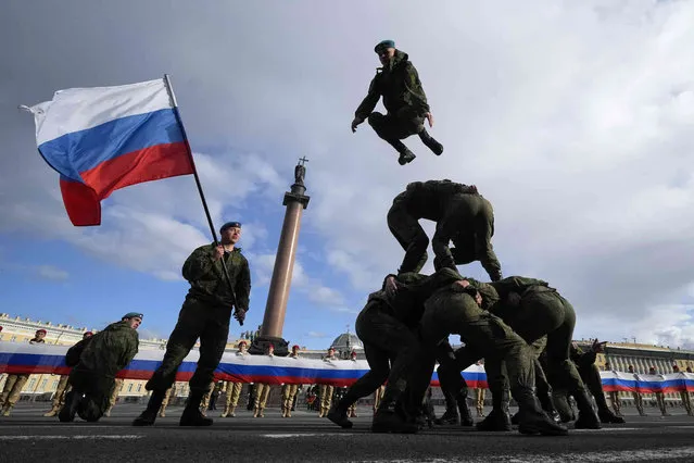 Servicemen demonstrate their skills during a rehearsal for the Victory Day military parade which will take place at Dvortsovaya (Palace) Square on May 9 to celebrate 78 years after the victory in World War II in St. Petersburg, Russia, Thursday, May 4, 2023. (Photo by Dmitri Lovetsky/AP Photo)