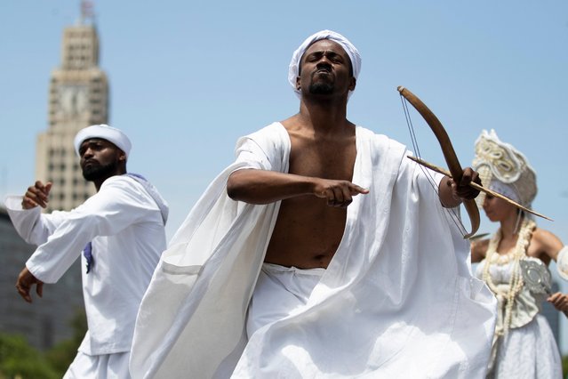 Artists perform during the Tia Ciata Parade at the annual celebration marking Black Consciousness Day in Rio de Janeiro, Thursday, November 20, 2025. (Photo by Bruna Prado/AP Photo)