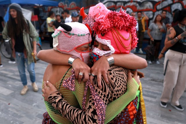 Women embrace each other during the International Safe Abortion Day in Mexico City on September 28, 2024. (Photo by Silvana Flores/AFP Photo)