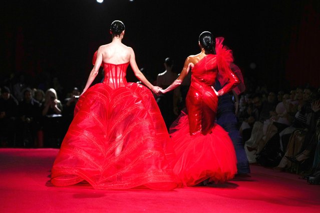Models Coco Rocha, left, and Winnie Harlow walk the runway during the Christian Siriano Fall/Winter 2025 fashion show at Chelsea Industrial during New York Fashion Week on Thursday, February 6, 2025, in New York. (Photo by Charles Sykes/Invision/AP Photo)
