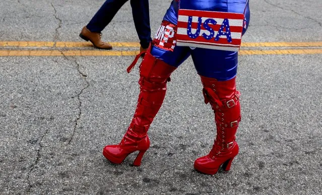 A person wears an outfit in the colours of the U.S. flag as supporters of former President Donald Trump arrive ahead his “Make America Great Again” rally in Pickens, South Carolina, U.S., July 1, 2023. (Photo by Evelyn Hockstein/Reuters)