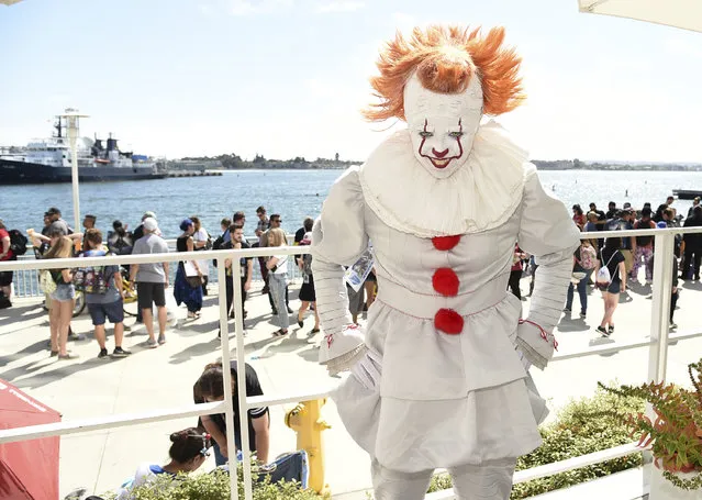 Juliana Bove, of San Diego, dressed as Pennywise from the film “It”, attends day two of Comic-Con International on Friday, July 20, 2018, in San Diego. (Photo by Richard Shotwell/Invision/AP Photo)