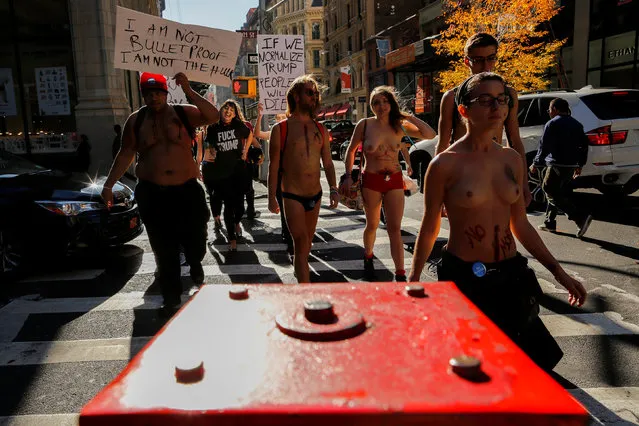 Demonstrators march during a protest against U.S. President-elect Donald Trump in Manhattan, New York, U.S. November 19, 2016. (Photo by Eduardo Munoz/Reuters)