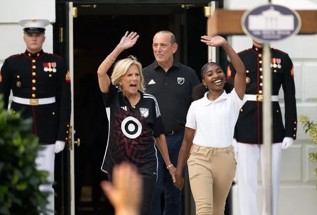 US First Lady Jill Biden arrives to speak alongside DC student Nevaeh Burroughs (R) and Major League Soccer (MLS) Commissioner Don Garber (C) during a youth soccer clinic with Major League Soccer (MLS) players and coaches ahead of the MLS All-Star game, during an event on the South Lawn of the White House in Washington, DC, July 17, 2023. (Photo by Saul Loeb/AFP Photo)