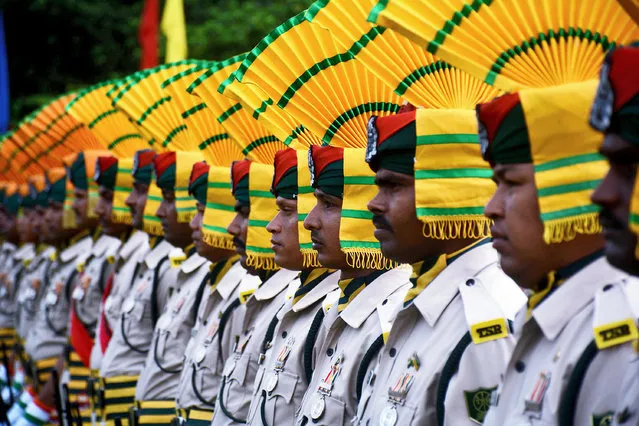 Indian paramilitary force personnel march pasts during the final dress rehearsal ahead of Independence Day celebration in Agartala, the capital of northeastern state of Tripura on August 13, 2018. August 15th to commemorate the nation's independence from the United Kingdom on 15 August 1947. (Photo by Arindam Dey/AFP Photo)