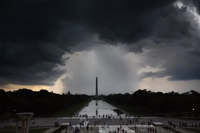 Storm clouds are seen over the Washington Monument on the National Mall, on Monday, August 7, 2023 in Washington. Severe storm warnings were issued throughout the day for the region. (Photo by Tom Brenner for The Washington Post)
