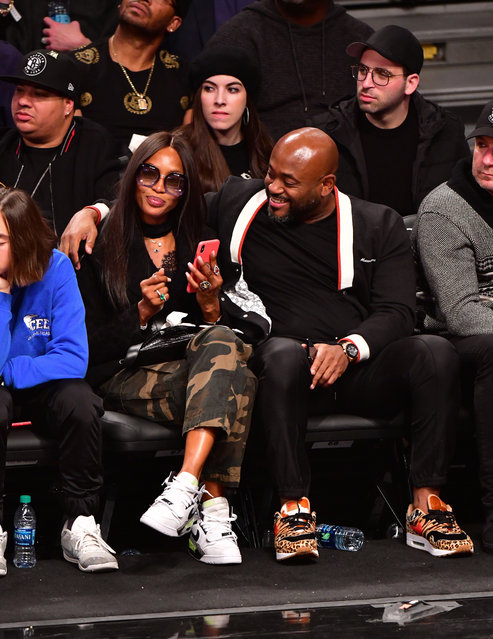 Naomi Campbell and Steve Stoute attend the Golden State Warriors vs Brooklyn Nets game at Barclays Center of Brooklyn on October 28, 2018 in the Brooklyn borough of New York City. (Photo by James Devaney/Getty Images)