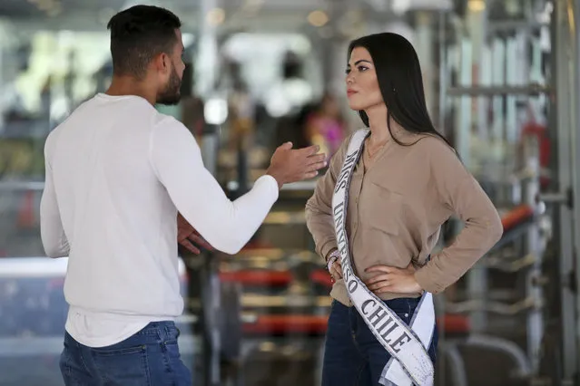 Venezuelan born Andrea Diaz, Miss Chile, takes part in a runway class with instructor Ellans De Santis in Santiago, Chile, Thursday, November 8, 2018. As thousands of people leave Venezuela each day to escape food shortages and an inflation rate that is expected to surpass 1 million percent, dozens of would-be beauty queens like Diaz are also taking flight and finding work as models and media personalities overseas. (Photo by Esteban Felix/AP Photo)