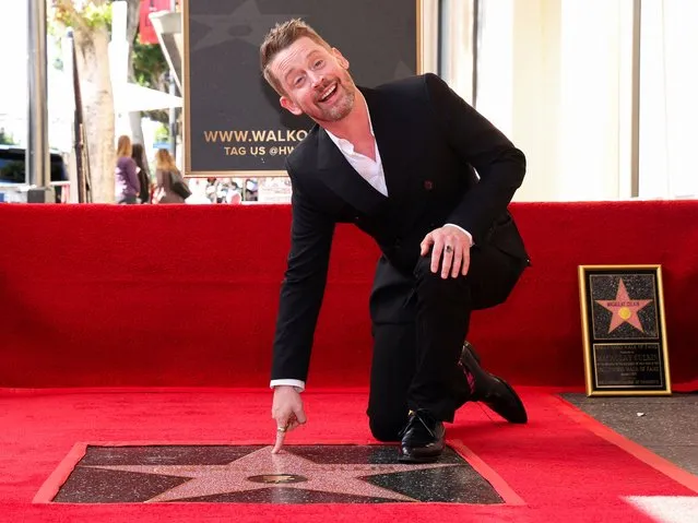 Actor Macaulay Culkin poses during the unveiling ceremony of his star on the Hollywood Walk of Fame, in Los Angeles, California, U.S. December 1, 2023. (Photo by Mario Anzuoni/Reuters)