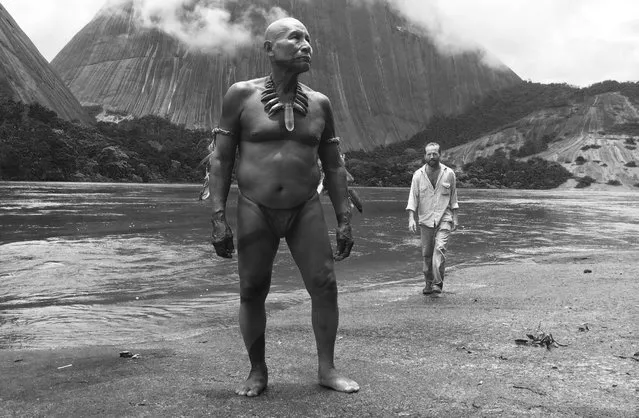 This image provided by courtesy of Oscilloscope Laboratories shows Antonio Bolivar Salvador, center, as old Karamakate, and Brionne Davis as the young explorer Evan in a scene from the film, “Embrace the Serpent”, directed by Ciro Guerra. The Colombian movie is nominated for an Academy Award for best foreign language film. The Oscars will be presented on Sunday, February 28, 2016, in Los Angeles. (Photo by Andres Barrientos/Oscilloscope Laboratories via AP Photo)