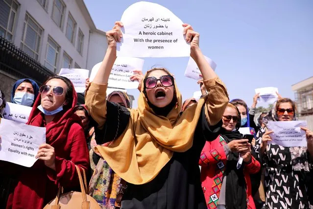 Afghan women take part in a protest march for their rights under the Taliban rule in the downtown area of Kabul on September 3, 2021. As the world watches intently for clues on how the Taliban will govern, their treatment of the media will be a key indicator, along with their policies toward women. When they ruled Afghanistan between 1996-2001, they enforced a harsh interpretation of Islam, barring girls and women from schools and public life, and brutally suppressing dissent. (Photo by Reuters/Stringer)