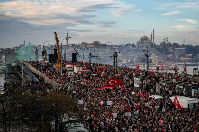 Thousands demonstrate to show solidarity with Palestinians amid the ongoing war in Gaza, in Istanbul, Turkey, Monday, January 1, 2024. (Photo by Emrah Gurel/AP Photo)