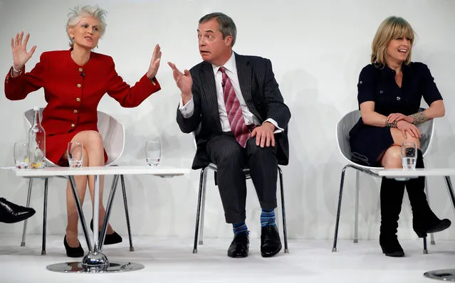 Former leader of Britain's UKIP party, Nigel Farage (C) reacts as he speaks with Italian-Swedish MEP Anna Maria Corazza Bildt (L) and British Journalist Rachel Johnson during a panel discussion at a conference on Brexit, at the Saatchi Gallery in London on February 19, 2019. The British government on Friday dismissed as a “hiccup” its latest parliamentary defeat over Brexit, saying it would press on with trying to renegotiate its EU divorce deal as exit day looms in just six weeks. (Photo by Tolga Akmen/AFP Photo)