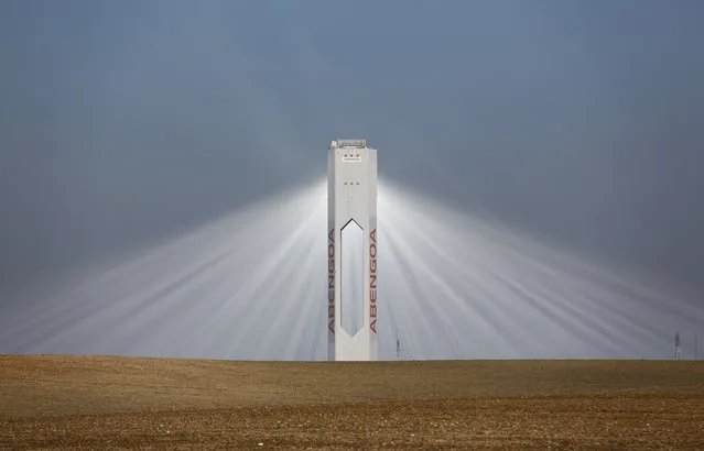 A tower of Abengoa solar plant at “Solucar” solar park is pictured in Sanlucar la Mayor, near the Andalusian capital of Seville, southern Spain on November 13, 2015. (Photo by Marcelo del Pozo/Reuters)
