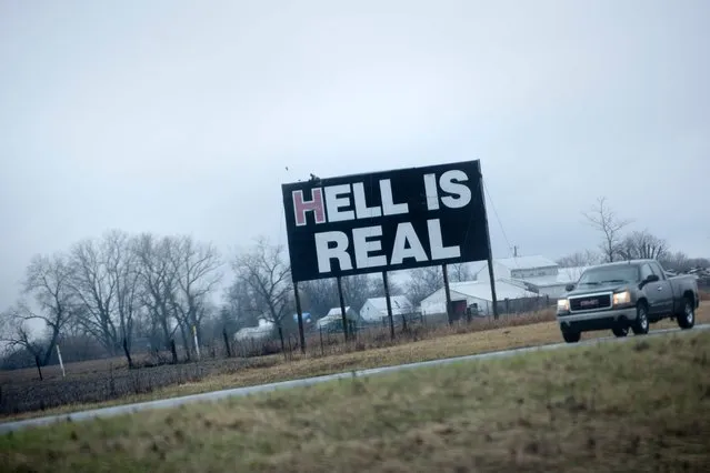 A sign declaring the existence of hell is seen March 13, 2016 in Columbus, Ohio. (Photo by Brendan Smialowski/AFP Photo)