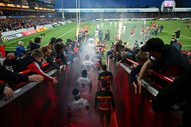 A general view of the inside of the stadium as players of Castres Olympique and Gloucester Rugby walk out of the tunnel prior to the EPCR Challenge Cup Round Of 16 match between Gloucester Rugby and Castres Olympique at Kingsholm Stadium on April 05, 2024 in Gloucester, England. (Photo by Dan Mullan/Getty Images)