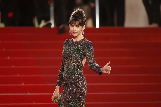 Jury member actress Sophie Marceau poses on the red carpet as she arrives for the screening of the film “Mountains May Depart” (Shan he gu ren) in competition at the 68th Cannes Film Festival in Cannes, southern France, May 20, 2015. (Photo by Benoit Tessier/Reuters)