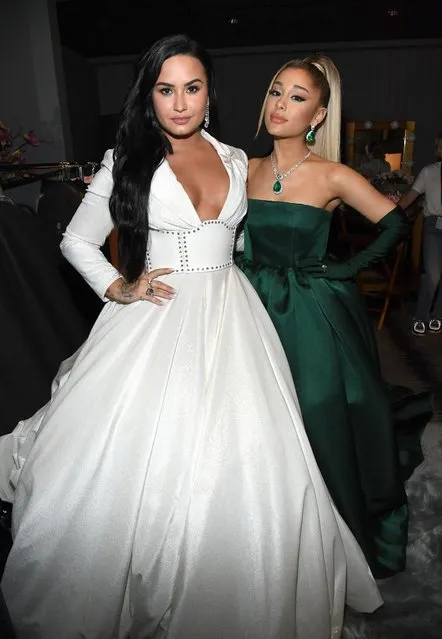 American singers Demi Lovato and  Ariana Grande during the 62nd Annual GRAMMY Awards at STAPLES Center on January 26, 2020 in Los Angeles, California. (Photo by Kevin Mazur/Getty Images for The Recording Academy)