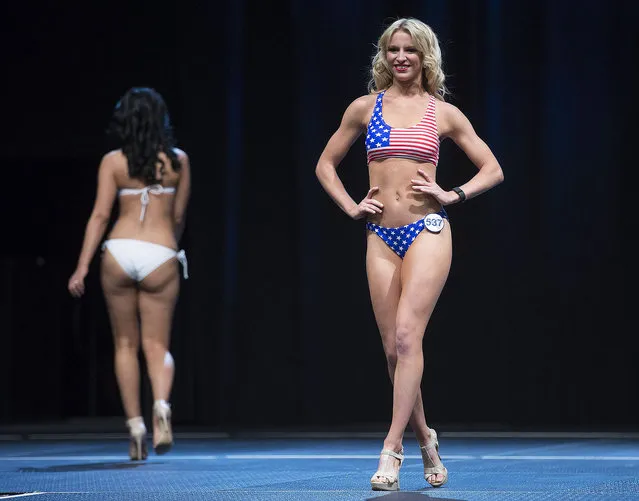 Los Angeles Rams cheerleader hopeful Gaebri A. (R) performs during the swimsuit portion of the squad's final auditions in Los Angeles, California, USA, 17 April 2016. The Rams NFL football team is returning to Los Angeles for the 2016 season after having left the city along with the Los Angeles Raiders after the 1994 season. (Photo by Eugene Garcia/EPA)