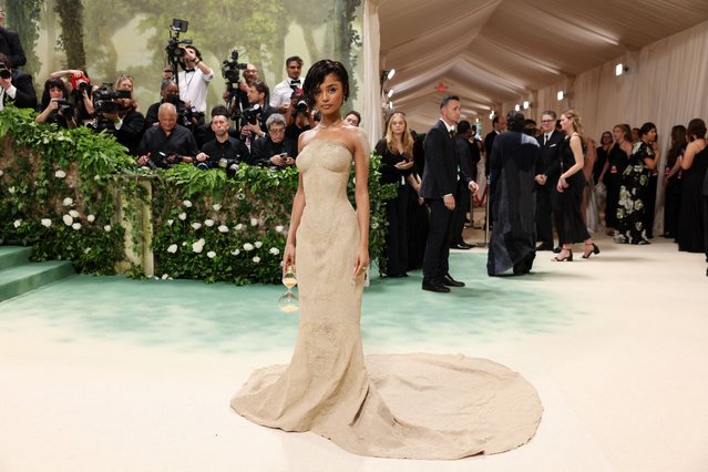 South African singer and songwriter Tyla poses at the Met Gala, an annual fundraising gala held for the benefit of the Metropolitan Museum of Art's Costume Institute with this year's theme “Sleeping Beauties: Reawakening Fashion” in New York City, New York, U.S., May 6, 2024. (Photo by Andrew Kelly/Reuters)