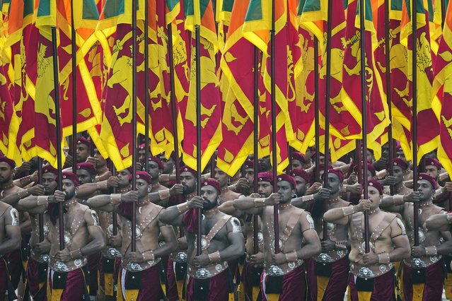 Sri Lankan soldiers march during the 76th Independence Day commemoration ceremony of Sri Lanka in Colombo, Sri Lanka, Sunday, February 4, 2024. (Photo by Eranga Jayawardena/AP Photo)