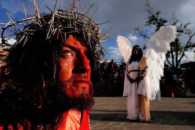 People take part in a performance of “The Passion of Jesus” on Good Friday in San Pedro Tlaquepaque, Mexico on April 7, 2023. (Photo by Ulises Ruiz/AFP Photo)