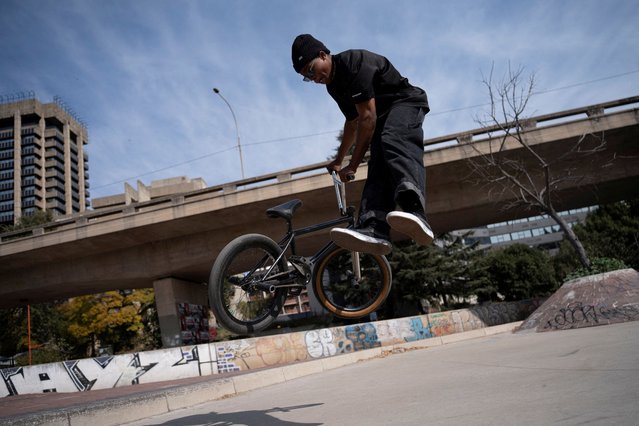 A rider performs a trick during a celebration of World BMX Day, in Johannesburg, South Africa, on July 20, 2024. (Photo by Ihsaan Haffejee/Reuters)