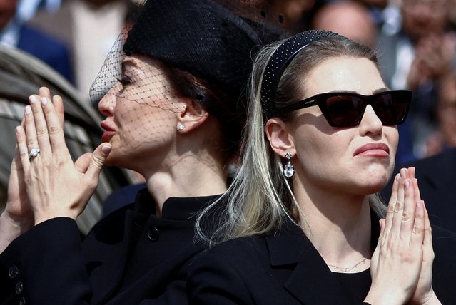 Barbara and Eleonora Berlusconi gesture during the state funeral of former Italian Prime Minister Silvio Berlusconi at the Duomo Cathedral, in Milan, Italy on June 14, 2023. (Photo by Yara Nardi/Reuters)