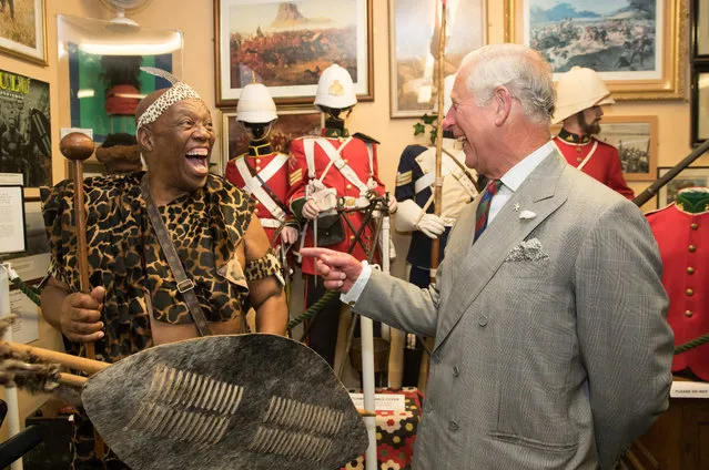 Prince Charles, Prince of Wales meets Elliot Ngubane dressed in traditional Zulu costume at the Royal Welsh Regimental Museum during The Prince of Wales' annual Summer visit to Wales on July 11, 2017 in Brecon, Wales. (Photo by Matt Cardy/Getty Images)